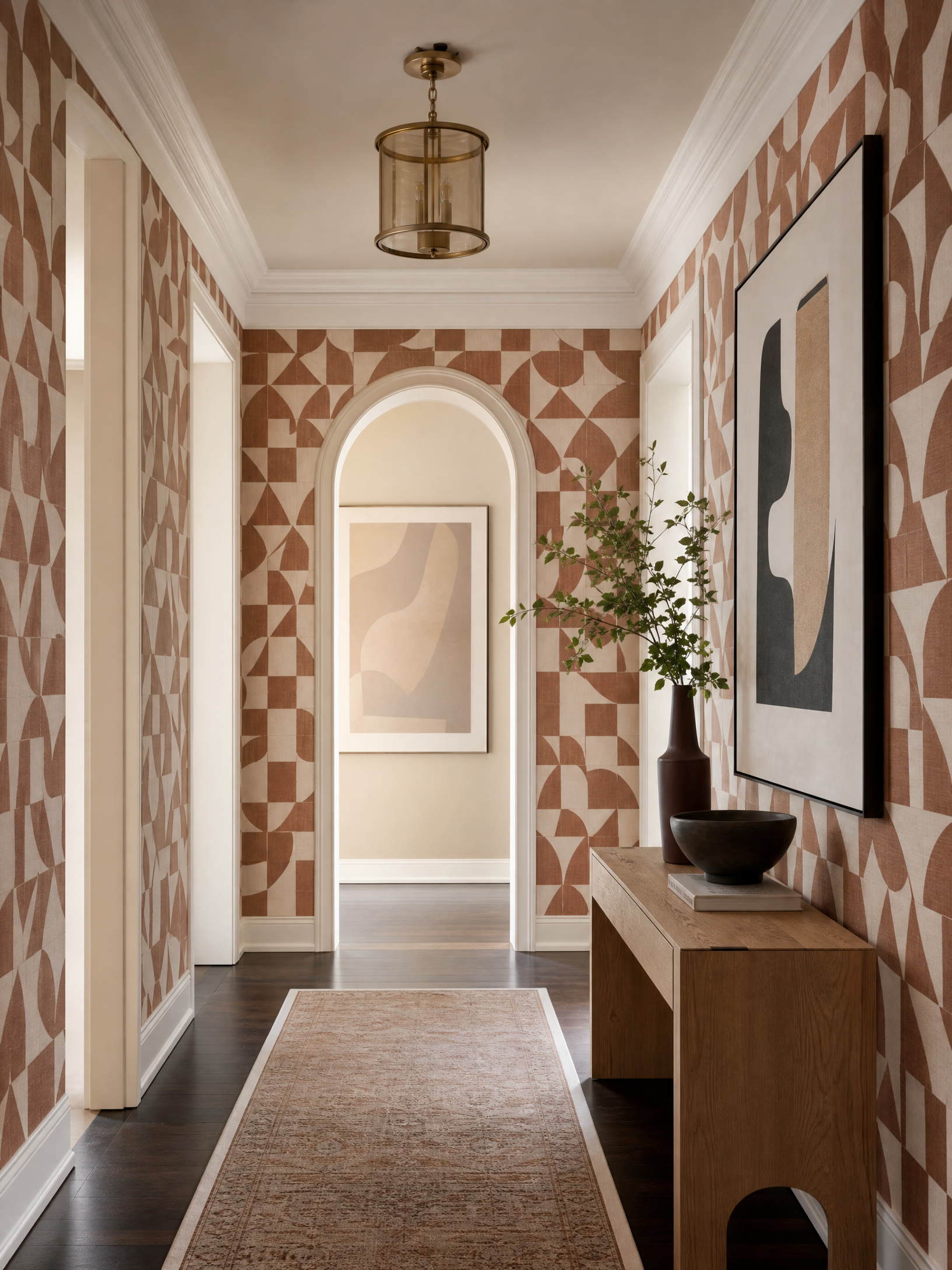 Refined hallway with geometric clay and ivory wallpaper